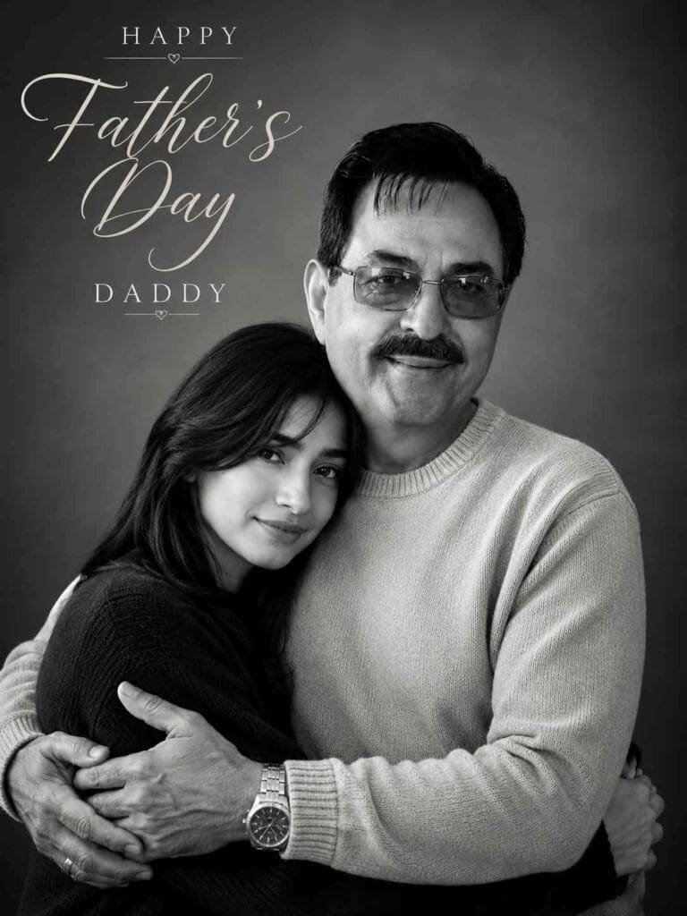 Father’s Day AI photo editing prompts - Create a high-quality black-and-white studio portrait from the